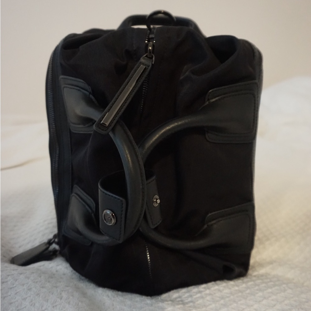 Caraa backpack. Wore it less than 5 times. Selling it bc I WFH.